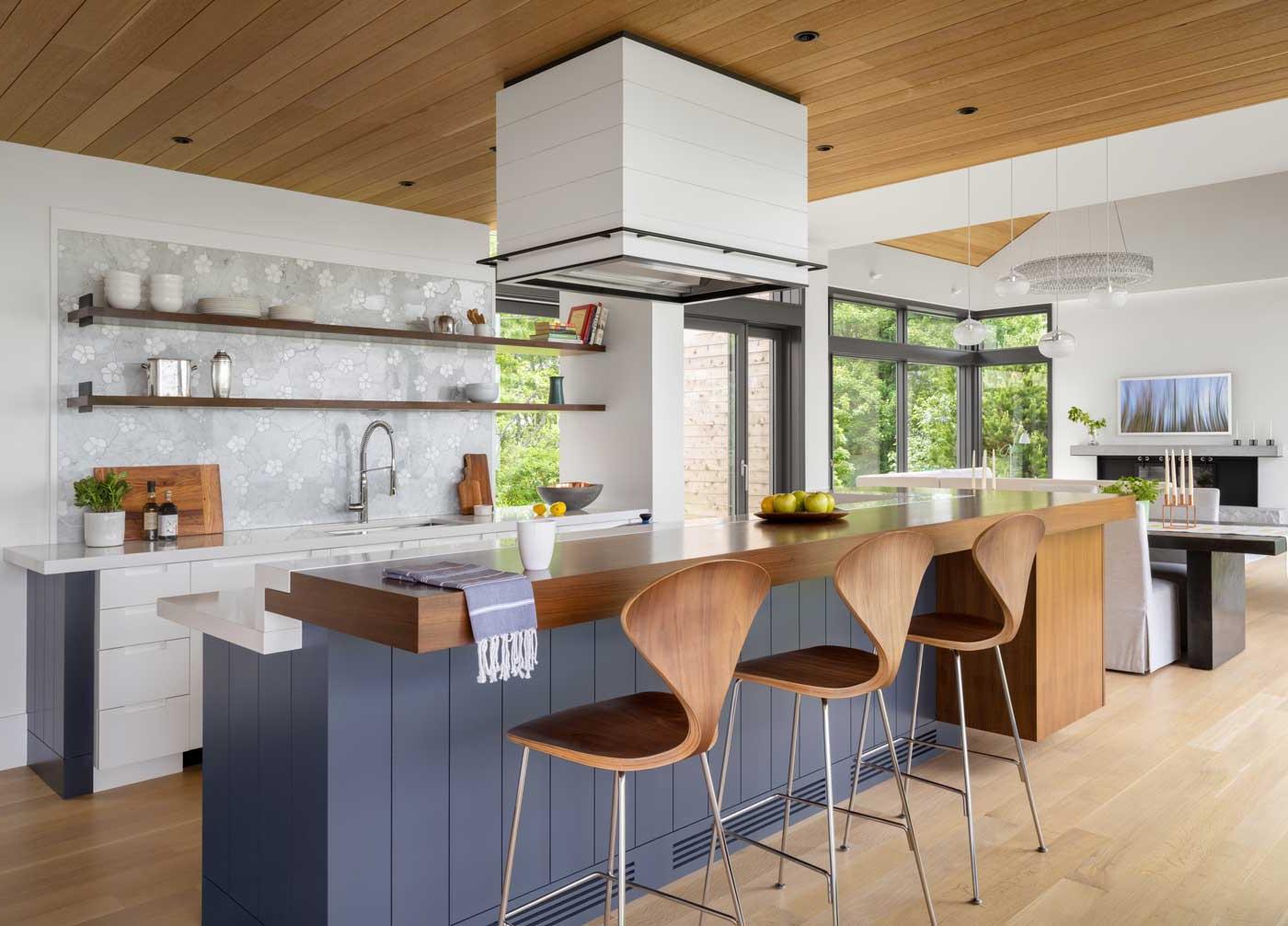modern kitchen with bar and stools